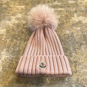 Women’s Moncler hat in pink with fur pom pom